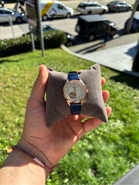 Bulova automatic open heart watch blue leather rose gold tone